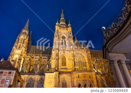 St Vitus Cathedral stands majestically beneath the night sky, glowing softly with golden lights. 123089489