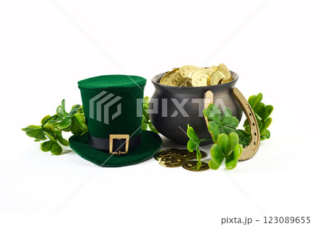 St. Patrick's Day Symbols. A green hat, black cauldron of gold coins 123089655