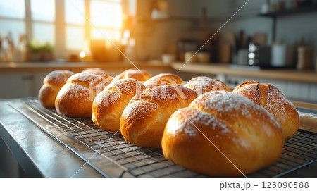 Freshly baked paska loaves cooling in a sunlit modern kitchen during Easter Freshly baked paska loaves cooling in a sunlit modern kitchen during Easter 123090588