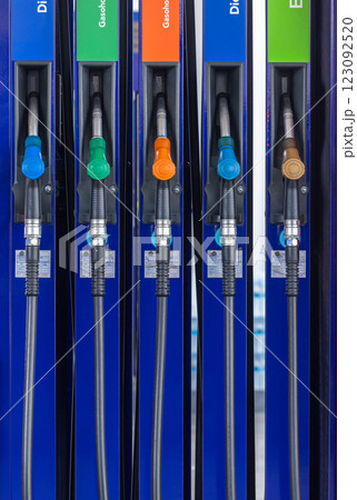 Fuel gasoline dispenser in gasoline station, Petrol pump filling nozzle at gasoline station fuel gasoline dispenser, Pistol pump gun fuel nozzle. 123092520