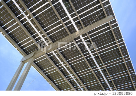 Solar panels installed over parking lot canopy shade for parked cars for effective generation of clean energy Solar panels installed over parking lot canopy shade for parked cars for effective generation of clean energy 123093880