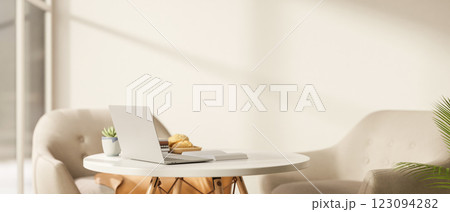 A White laptop on the wooden table with decorative item in the cosy cafe, workspace with sunlight. 123094282