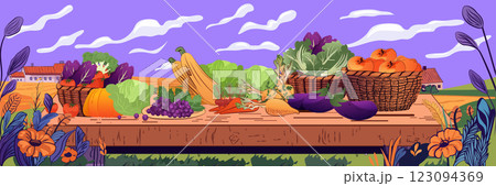 Harvest vegetables on wooden table autumn. Vibrant produce including pumpkins grapes carrots in baskets against rural landscape with purple sky and flowers 123094369