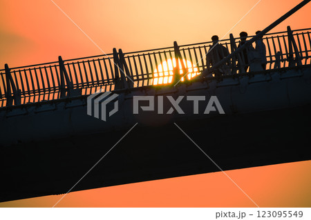Sunset Over Lover's Bridge with Tourist Silhouettes, Tamsui, Taiwan. 123095549