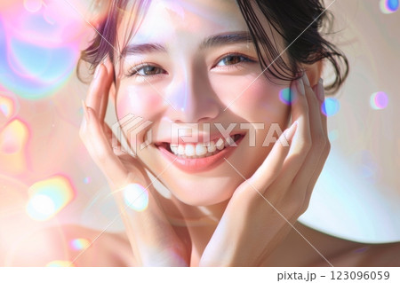 頬に手をあてる肌の綺麗な日本人女性モデルのポートレート（美容・艶・透明感）	 123096059