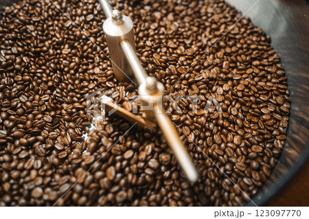 Coffee beans roasted in a coffee machine and coffee roasting Coffee beans roasted in a coffee machine and coffee roasting 123097770