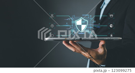 Cybersecurity and privacy protection network security computer and safe data concept. Businessmen protect personal data information from viruses with virtual screen interfaces. 123099275
