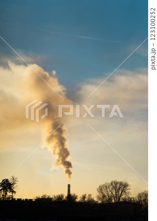 Environmental pollution from factories at sunrise. Contrast of nature and industrial pollution at sunrise Environmental pollution from factories at sunrise. Contrast of nature and industrial pollution at sunrise 123100252