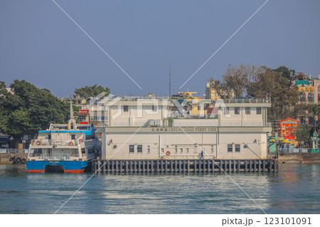 Cheung Chau Ferry Pier on a Sunny Day Near Waterfront Buildings Dec 28 2024 123101091