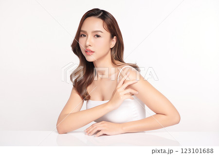 Beautiful young asian woman with clean fresh skin on white background, Face care, Facial treatment, Cosmetology, beauty and spa, Asian women portrait. Beautiful young asian woman with clean fresh skin on white background, Face care, Facial treatment, Cosmetology, beauty and spa, Asian women portrait. 123101688