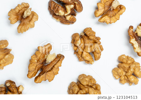 Walnut kernels, white background, top view. 123104513