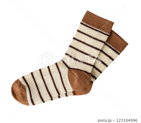 Pair of beige brown striped socks isolated on a white background. Pair of beige brown striped socks isolated on a white background. 123104996