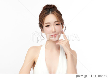 Beautiful young asian woman with clean fresh skin on white background, Face care, Facial treatment, Cosmetology, beauty and spa, Asian women portrait. Beautiful young asian woman with clean fresh skin on white background, Face care, Facial treatment, Cosmetology, beauty and spa, Asian women portrait. 123108349