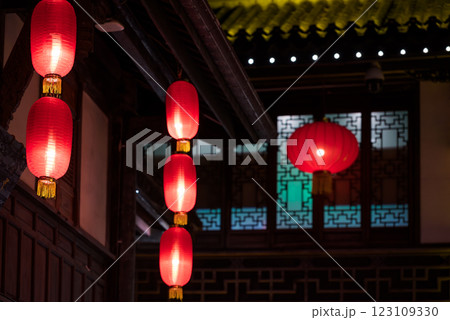 Traditional Chinese Lanterns in a Courtyard at Night Traditional Chinese Lanterns in a Courtyard at Night 123109330