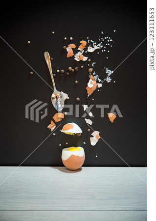 Black background, minimalism and egg in section Black background, minimalism and egg in section 123111653