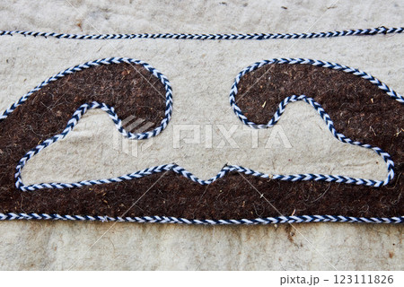 Fragment of Kyrgyz national pattern on a felt yurt 123111826