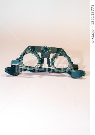 optical device for examining vision a pink surface 123112775