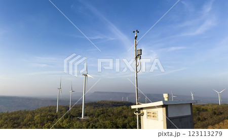 Win measuring device at a windmill power generator farm. Win measuring device at a windmill power generator farm. 123113279
