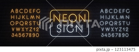 Neon Duo Yellow and White alphabet on brick wall background. Template with glow letters for light text sign. 123113475