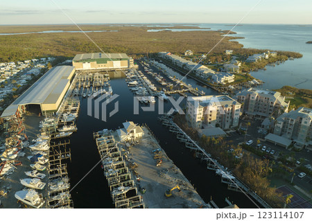 Hurricane Ian destroyed boat station in Florida coastal area. Natural disaster and its consequences Hurricane Ian destroyed boat station in Florida coastal area. Natural disaster and its consequences 123114107