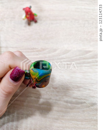 A Colorful Miniature Mug Set Against a Fun and Playful Background for Creative Displays A Colorful Miniature Mug Set Against a Fun and Playful Background for Creative Displays 123114733