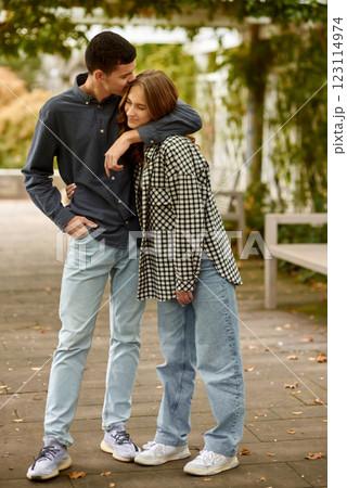 Young Cute Female Hugs Boyfriend. In Autumn Outdoor. Lovers Walking in Park. Attractive Funny Couple. Lovestory in Forest. Man and Woman. Cute Lovers in the Park. Family Concept. Happy Couple. Young Cute Female Hugs Boyfriend. In Autumn Outdoor. Lovers Walking in Park. Attractive Funny Couple. Lovestory in Forest. Man and Woman. Cute Lovers in the Park. Family Concept. Happy Couple. 123114974