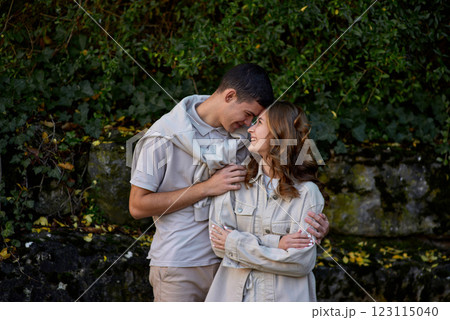 Embracing Teen Love in the Greenery of the Park. 123115040