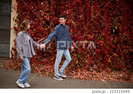 Young Cute Female Hugs Boyfriend. In Autumn Outdoor. Lovers Walking in Park. Attractive Funny Couple. Lovestory in Forest. Man and Woman. Cute Lovers in the Park. Family Concept. Happy Couple. Young Cute Female Hugs Boyfriend. In Autumn Outdoor. Lovers Walking in Park. Attractive Funny Couple. Lovestory in Forest. Man and Woman. Cute Lovers in the Park. Family Concept. Happy Couple. 123115049
