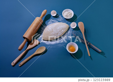 Baking Ingredients Spread on Blue Tabletop Baking Ingredients Spread on Blue Tabletop 123115989