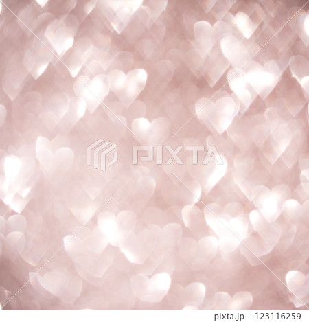 Abstract background of heart shapes with soft glowing light and bokeh effect Abstract background of heart shapes with soft glowing light and bokeh effect 123116259