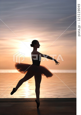 夕景の湖畔で踊る美しい姿のバレリーナ 123119049