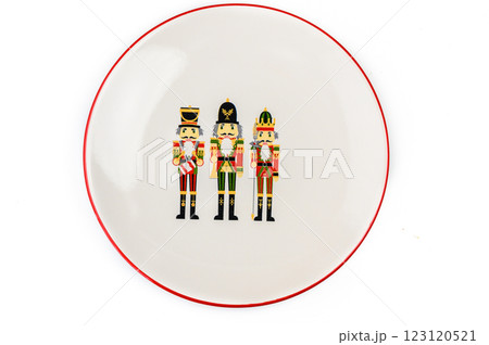 Festive plate featuring colorful nutcracker figurines ready for holiday celebrations and gatherings 123120521