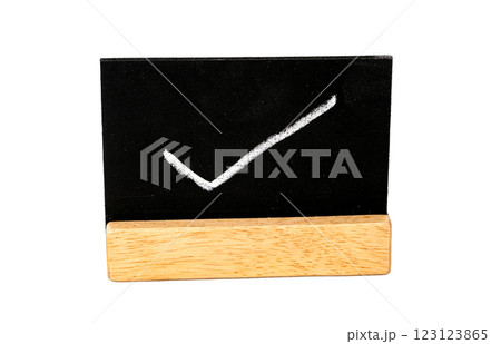 Checkmark on Mini Chalkboard on white background. 123123865