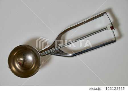 Ice cream stainless steel utensil on white backround 123128535