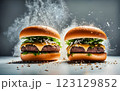 An impressive double-decker burger stacked with fresh lettuce, onions, cheese, and dripping sauce, with ingredients flying dramatically in the background, creating an exciting food explosion. 123129852