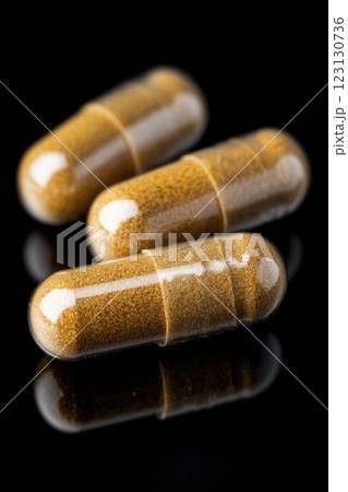 Turmeric: golden spice, ancient remedy, natural antioxidant, culinary ingredient, curcumin source, traditional medicine, health booster, vibrant powder, inflammation support, wellness enhancer. 123130736