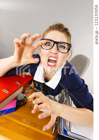 Angry mad bossy businesswoman being furious Angry mad bossy businesswoman being furious 123133956