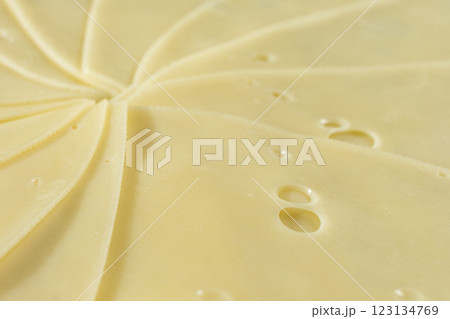 Semi-hard cheese close-up, thin slices 123134769