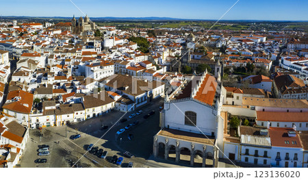 Portugal travel, medieval Evora town Unesco heritage site. Aerial panoramic drone view of down town , Bones Chapel in Sao Francisco Church and cathedral Santa Maria Assunta 123136020