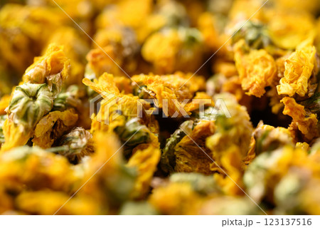 Dried Chrysanthemum flower tea background, Healthy herbal tea Dried Chrysanthemum flower tea background, Healthy herbal tea 123137516