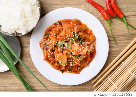 Stir fried kimchi cabbage with pork eating with cooked rice, Korean food, Table top view 123137552