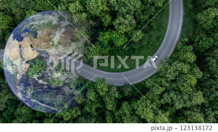 Aerial view EV car electric vehicle car alternative sustainable energy eco power, EV car electric vehicle car on middle green tree forest road with globe earth planet, Alternative sustainable energy. Aerial view EV car electric vehicle car alternative sustainable energy eco power, EV car electric vehicle car on middle green tree forest road with globe earth planet, Alternative sustainable energy. 123138172