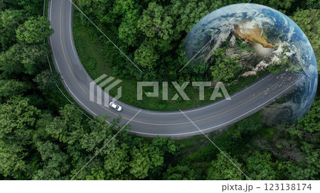 Aerial view EV car electric vehicle car alternative sustainable energy eco power, EV car electric vehicle car on middle green tree forest road with globe earth planet, Alternative sustainable energy. Aerial view EV car electric vehicle car alternative sustainable energy eco power, EV car electric vehicle car on middle green tree forest road with globe earth planet, Alternative sustainable energy. 123138174