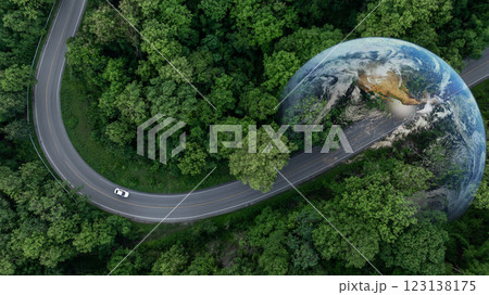 Aerial view EV car electric vehicle car alternative sustainable energy eco power,  EV car electric vehicle car on middle green tree forest road with globe earth planet, Alternative sustainable energy. 123138175