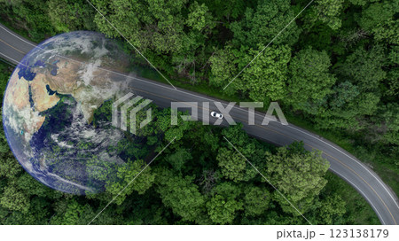 Aerial view EV car electric vehicle car alternative sustainable energy eco power,  EV car electric vehicle car on middle green tree forest road with globe earth planet, Alternative sustainable energy. 123138179