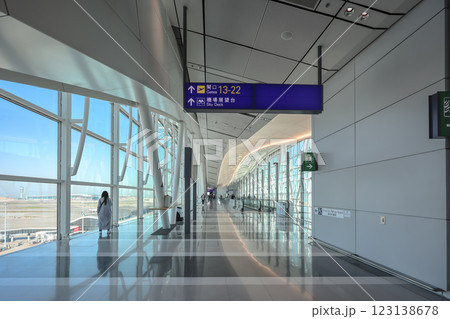 Dec 3 2024 Airport Terminal with Large Windows Overlooking Aircraft 123138678