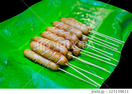 Top view of Isan Sausage on banana leaf, focus selective 123139611