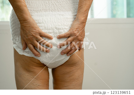 Asian senior woman patient wearing incontinence diaper in hospital, healthy strong medical. 123139651