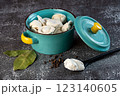 Meat dumplings - russian pelmeni in a bowl on a dark background 123140605