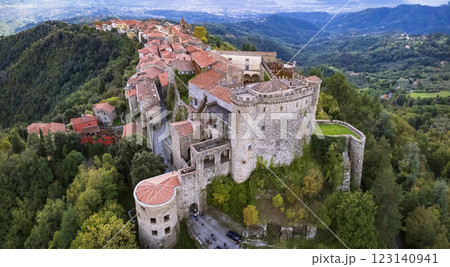 Italy, Tuscany region. impressive medieval village (borgo) and castle Fosdinovo. aerial high angle view. beautiful italian castles o 123140941